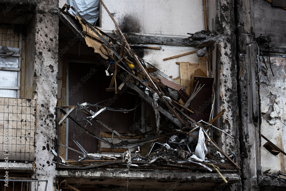 KYIV, UKRAINE - APR 21, 2022: The facade of an apartment building on Koshytsia str. was destroyed by the Kalibr cruise missile on the second day of the full-scale Russian invasion of Ukraine.