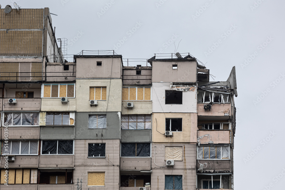 KYIV, UKRAINE - APR 21, 2022: The rooftop and apartments of an apartment building on Poznyaky was destroyed by the Kalibr cruise missile at the 17 march of the full-scale Russian invasion of Ukraine