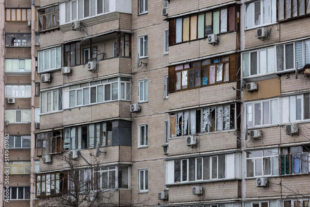 KYIV, UKRAINE - APR 21, 2022: The facade of an apartment building on Koshytsia str. was destroyed by the Kalibr cruise missile on the second day of the full-scale Russian invasion of Ukraine.