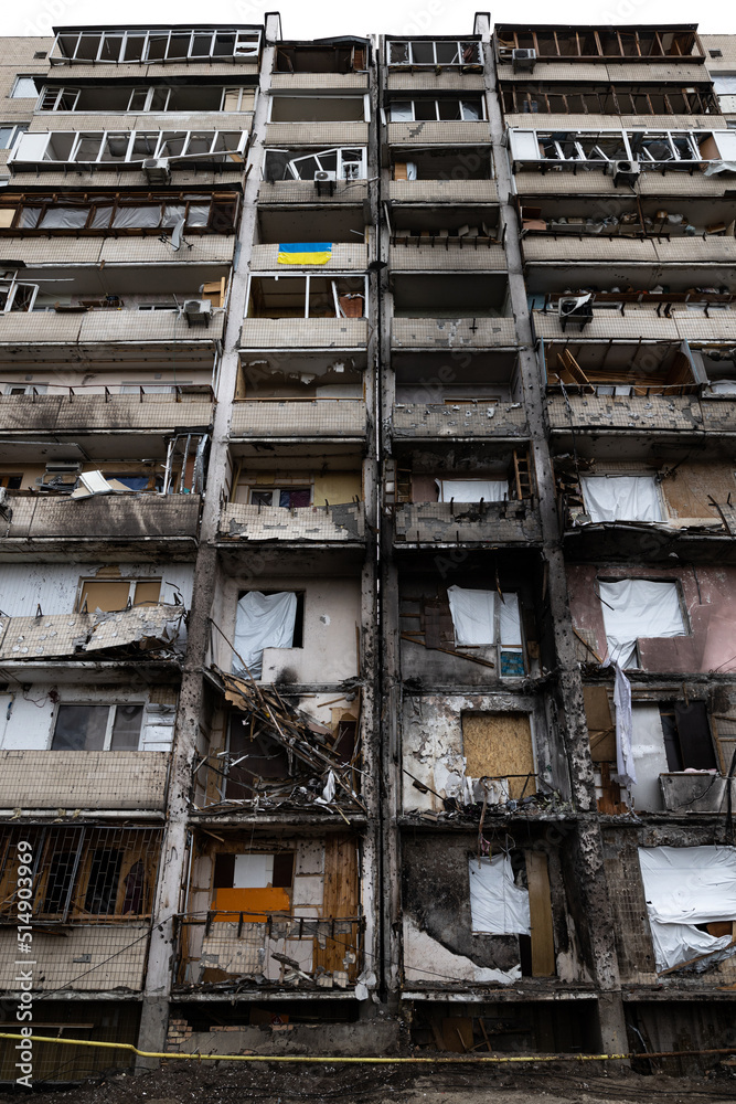 KYIV, UKRAINE - APR 21, 2022: The facade of an apartment building on Koshytsia str. was destroyed by the Kalibr cruise missile on the second day of the full-scale Russian invasion of Ukraine.