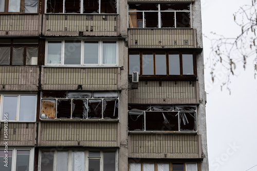 KYIV, UKRAINE - APR 21, 2022: The rooftop and apartments of an apartment building on Poznyaky was destroyed by the Kalibr cruise missile at the 17 march of the full-scale Russian invasion of Ukraine photo