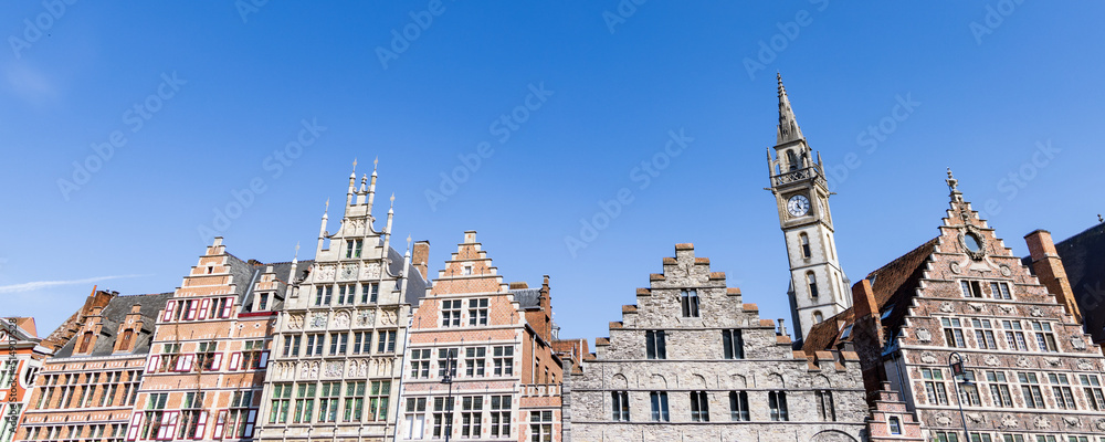 Ancient gable houses along the Korenlei in Ghent port city in northwest Belgium during a sunny day