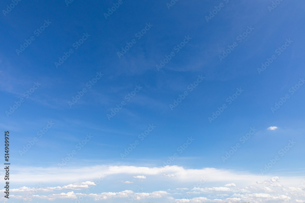 blue sky background with small clouds
