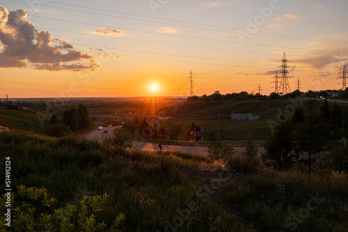 Sunset at the coast of the lake. Nature landscape.