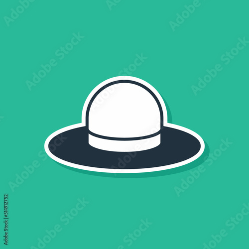Blue Man hat with ribbon icon isolated on green background. Vector