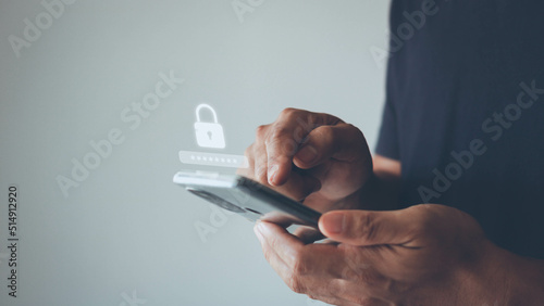 Asian businessman using the smart mobile phone to access on smartphone for validate password for biometric two steps authentication to unlock security, Business Technology security Concept photo