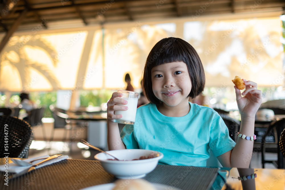 Little girl have breakfast, happy time
Little girl have breakfast, happy time