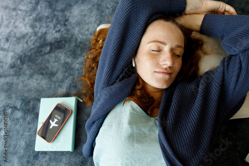 Beautiful woman resting with phone on flight mode at home