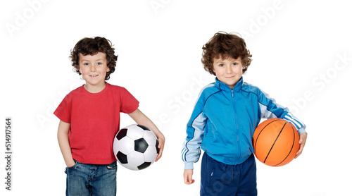 Twins holding a sport balls