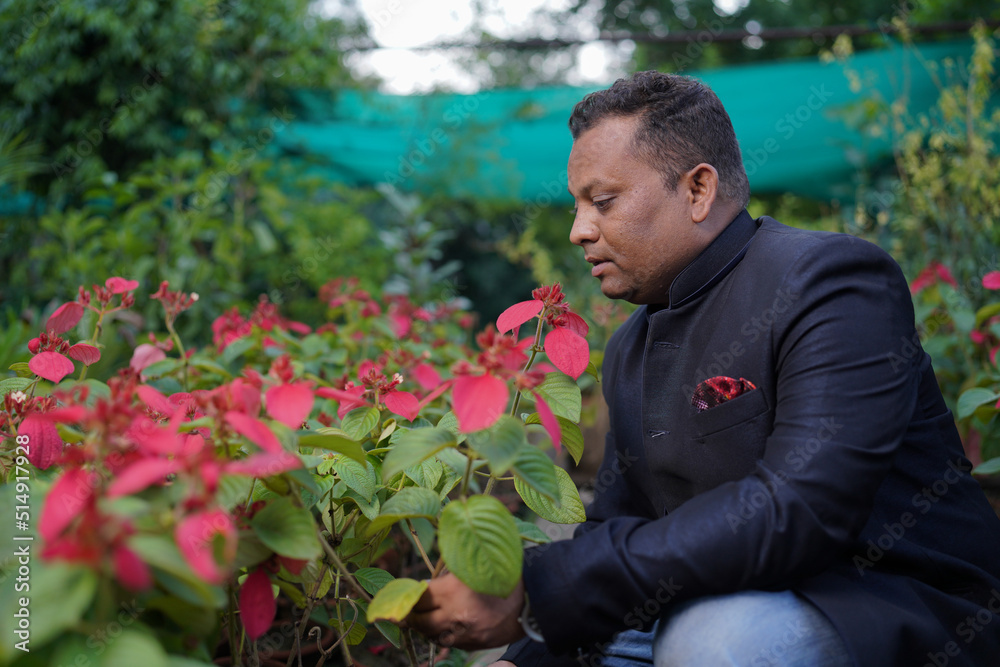A young Indian man encouraging towards plantation. ''selective focus
