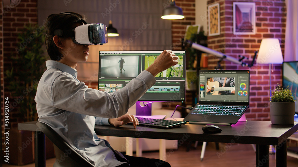 Videographer using vr glasses and editing software on pc to create visual  effects on video montage, augmented reality. Movie footage edit with 3d  headset and film on computer. . Photos | Adobe Stock