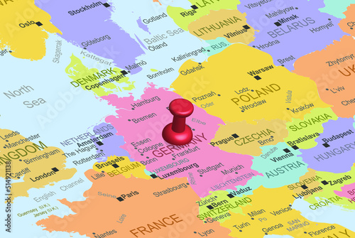 Germany with red fastener pushpin on europe map, close up Germany, travel idea, colorful map with location icon, vacation concept