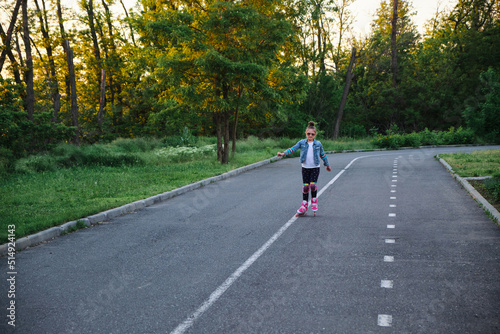 Wallpaper Mural Girl riding roller skates in the park Torontodigital.ca