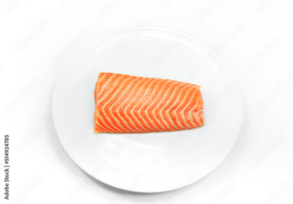 raw fish Salmon on white dish on white background ,salmon steak raw fish Salmon on white dish on white background ,salmon steak