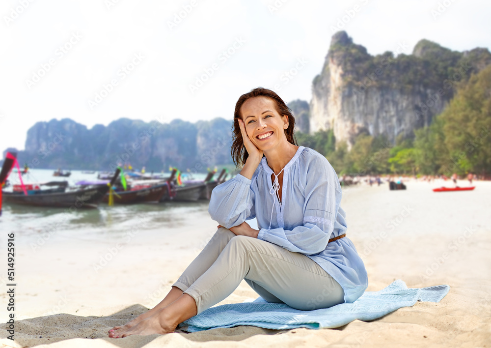 Fototapeta premium travel, tourism and vacation concept - happy smiling woman over tropical beach background in french polynesia