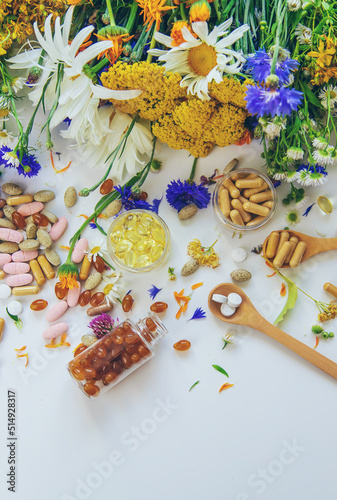 Homeopathy and dietary supplements from medicinal herbs. Selective focus.