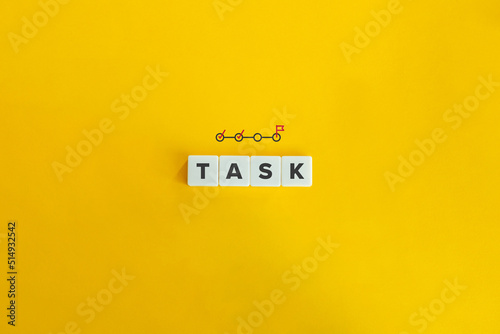 Task Word on Letter Tiles on Yellow Background. Minimal Aesthetics. photo