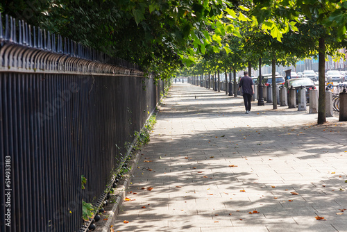 One Man walking on a Footpath in Dublin Ireland 2021