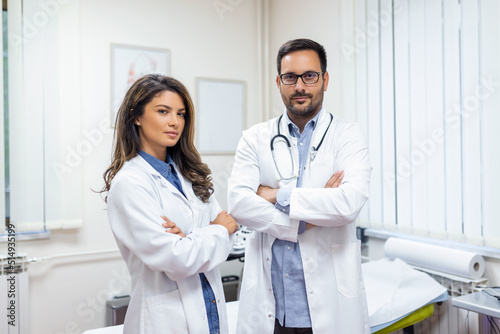 Portrait of two confident young doctors working in a hospital