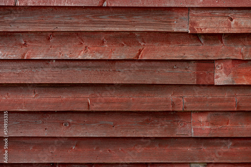 Texture of horizontal old wooden red wall