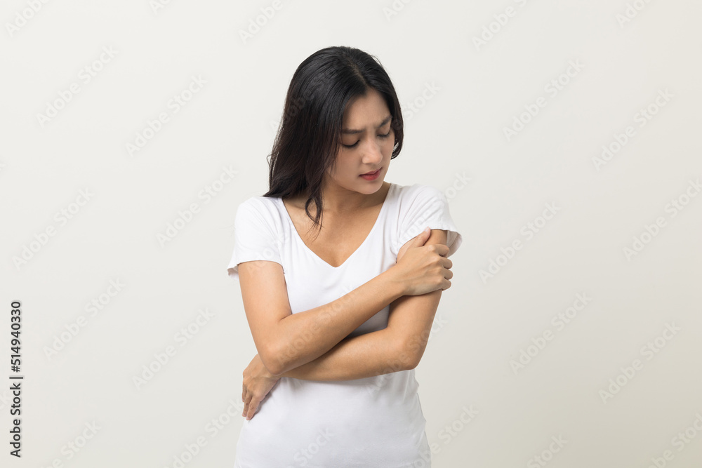 Asian women have skin problems She felt irritation on her skin. Skin infection itching red rash scratching with hands. She around 25 Wearing white shirt standing on isolate background Asian women have skin problems She felt irritation on her skin. Skin infection itching red rash scratching with hands. She around 25 Wearing white shirt standing on isolate background