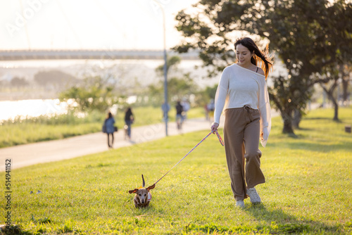 Woman go to park with her dog