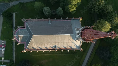 Drone look to gothic revival style Catholic church in small town Chrastava in the North of the Czech Republic during sunset photo