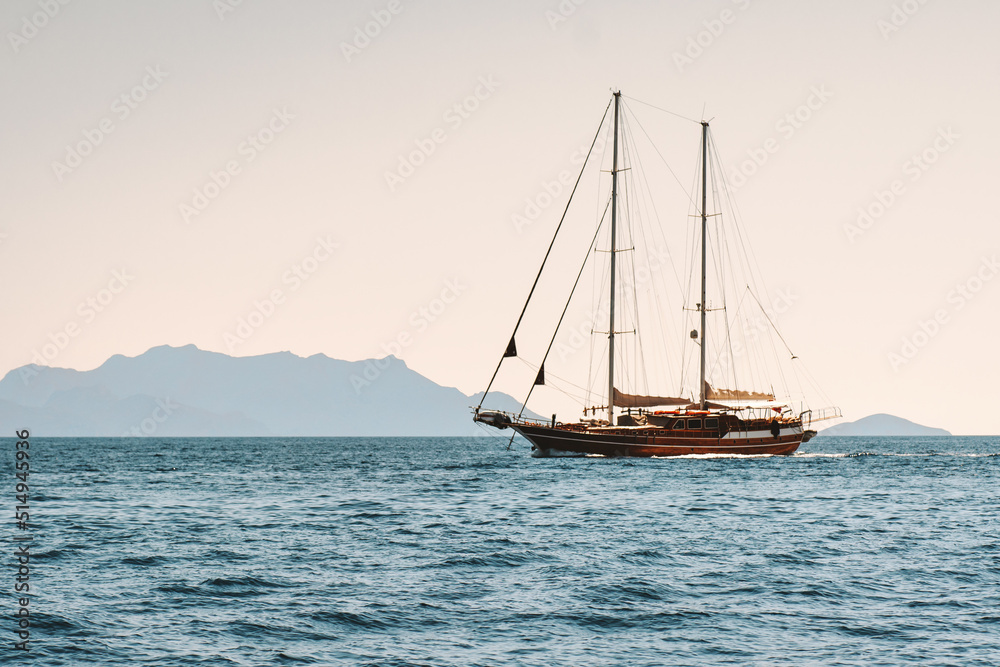 Sailing boat in Aegean sea landscape travel yachting tour cruise beautiful scenery Sailing boat in Aegean sea landscape travel yachting tour cruise beautiful scenery
