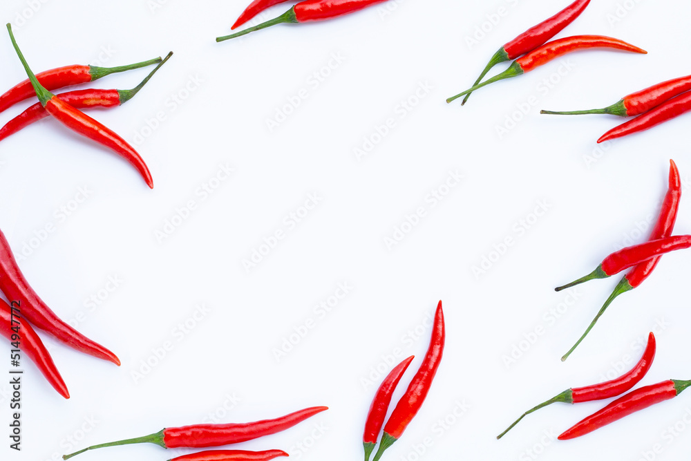 Frame made of hot chili peppers on white background. Top view Frame made of hot chili peppers on white background. Top view