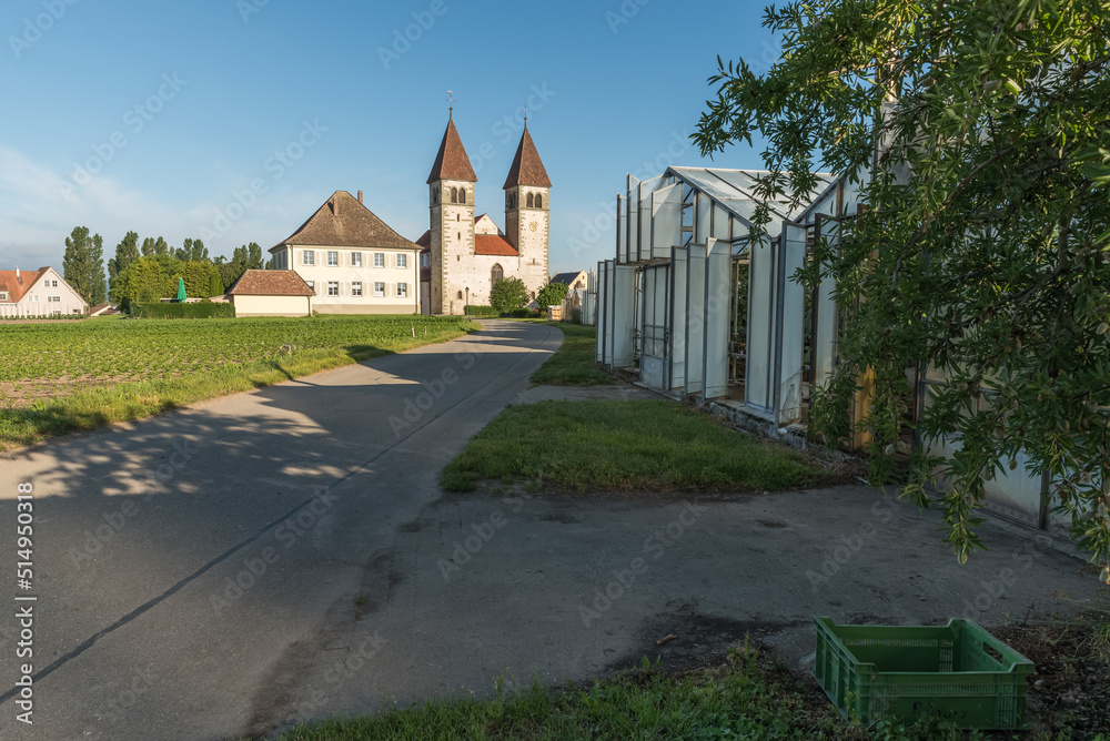 Church of St. Peter and Paul and greenhouses on Reichenau Island, Baden-Wuerttemberg, Germany