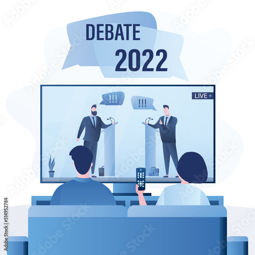 Love couple watch tv show with leaders of opposing political parties. Male politics on screen. People watching political debate before elections 2022 year. TV evening entertainment.