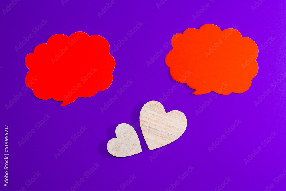 Red clouds for Valentine's day concept.Communication between two hearts. Place for your text.Purple,veri peri background. Copy space.