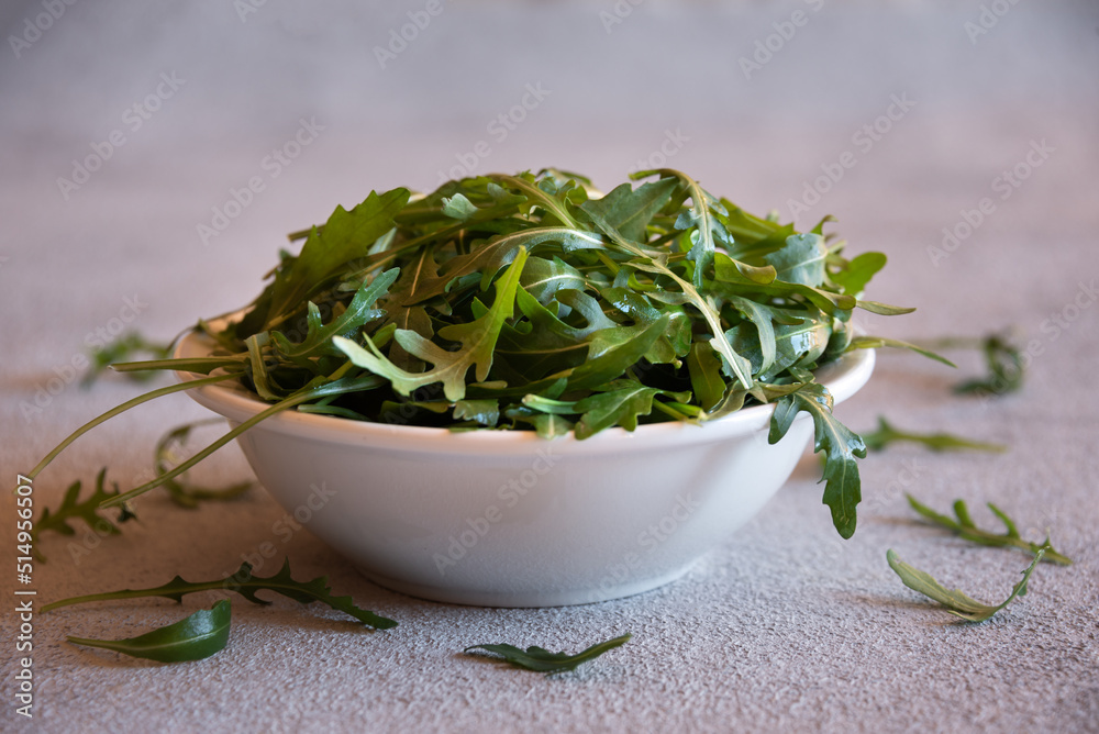 Fresh arugola leaves, delicious and healthy salad ingredient Fresh arugola leaves, delicious and healthy salad ingredient