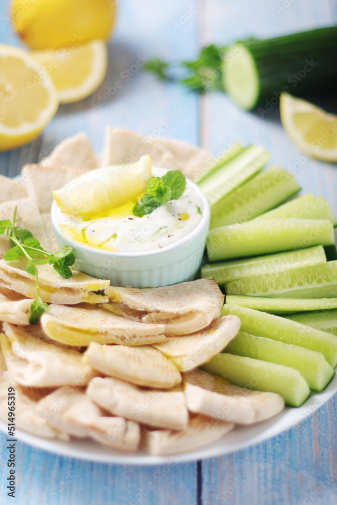Tzatziki, Greek dip sauce with pita and cucumbers