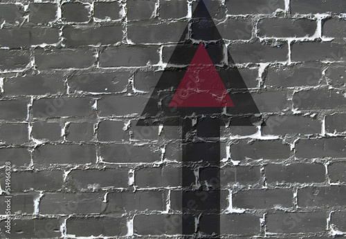 Number 1 on the background of a black brick wall.