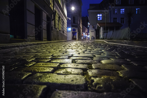 Stone pavement of the night city photo
