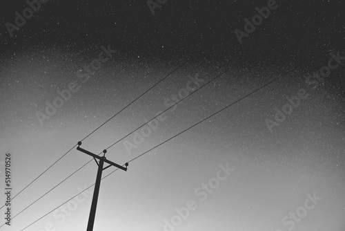 pole and wires at night