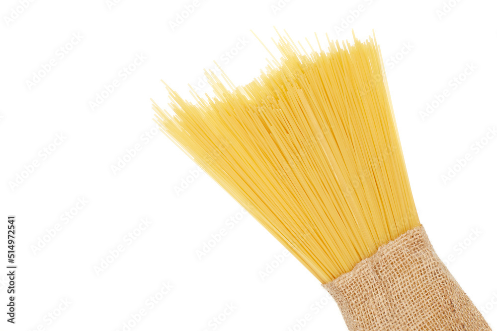 Raw spaghetti in sackcloth isolated on white background Raw spaghetti in sackcloth isolated on white background