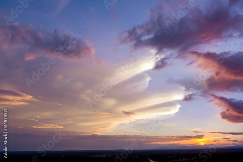Fototapeta Naklejka Na Ścianę i Meble -  Gorgeous view dramatic orange sunset through the clouds