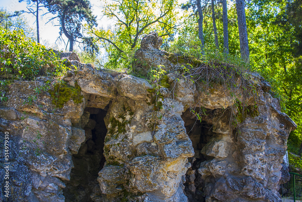 Grotto next to lake in park in biosphere reserve Askania-Nova, Ukraine Grotto next to lake in park in biosphere reserve Askania-Nova, Ukraine