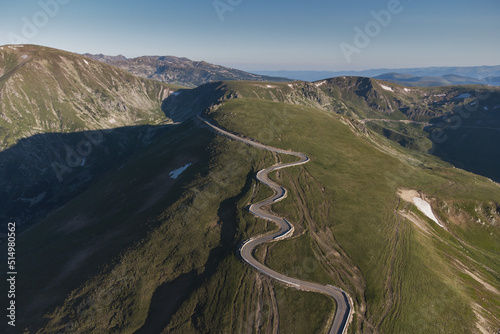 Aerial view of Transalpina mountain road at sunrise