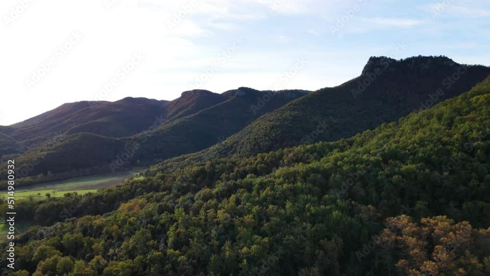 Aerial scene with drone of the autumn landscape in La Vall D En Bas, La Garrotxa, Girona, Spain. 4K UHD Aerial scene with drone of the autumn landscape in La Vall D En Bas, La Garrotxa, Girona, Spain. 4K UHD