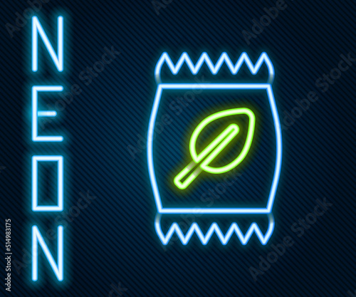 Glowing neon line Fertilizer bag icon isolated on black background. Colorful outline concept. Vector