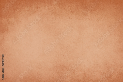 Textured orange colored background, empty copy space for text, scratched wall structure, templete for scrapbook, vintage style 