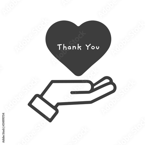 Thank Youの文字が書いてあるハートを持っている人の手 - 感謝の気持ちのイメージ素材
