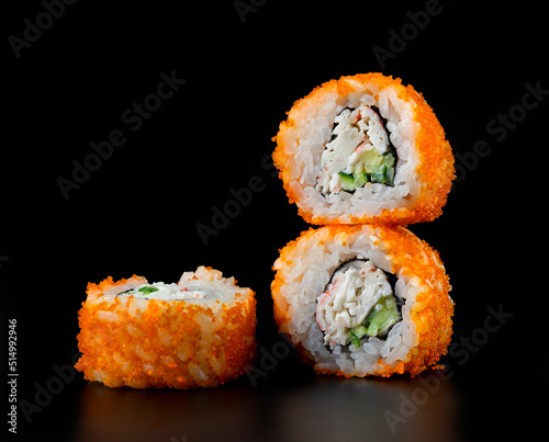Sushi California Roll on black background