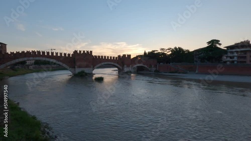 Time lapse, castelvecchio with adige river, Verona Italy photo
