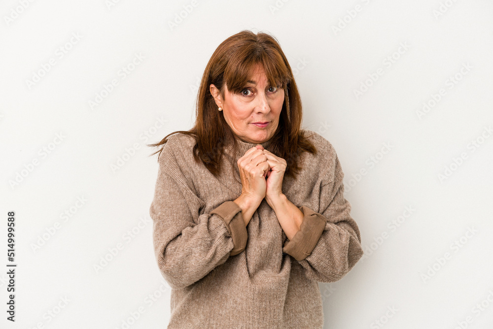 Middle age caucasian woman isolated on white background scared and afraid. Middle age caucasian woman isolated on white background scared and afraid.