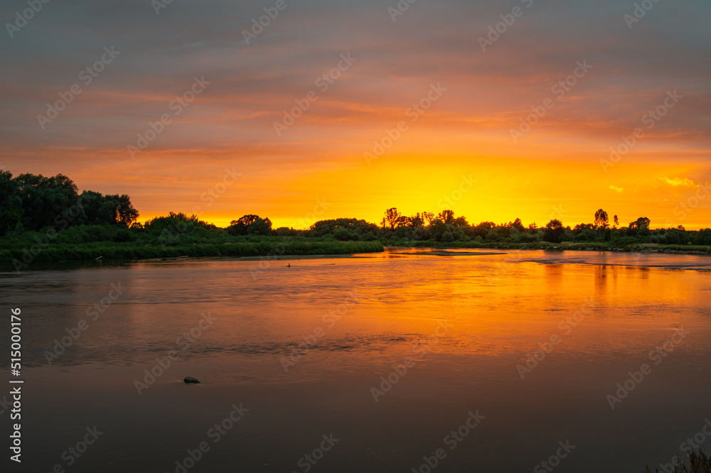fiery sunset river bug july