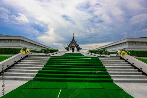 Background of a beautiful church in the middle of the water, important religious attractions in Udon Thani province of Thailand, Wat Pa Ban Tat,Atthaborin Luang Maha Bua Yannasampanno Museum Building. photo